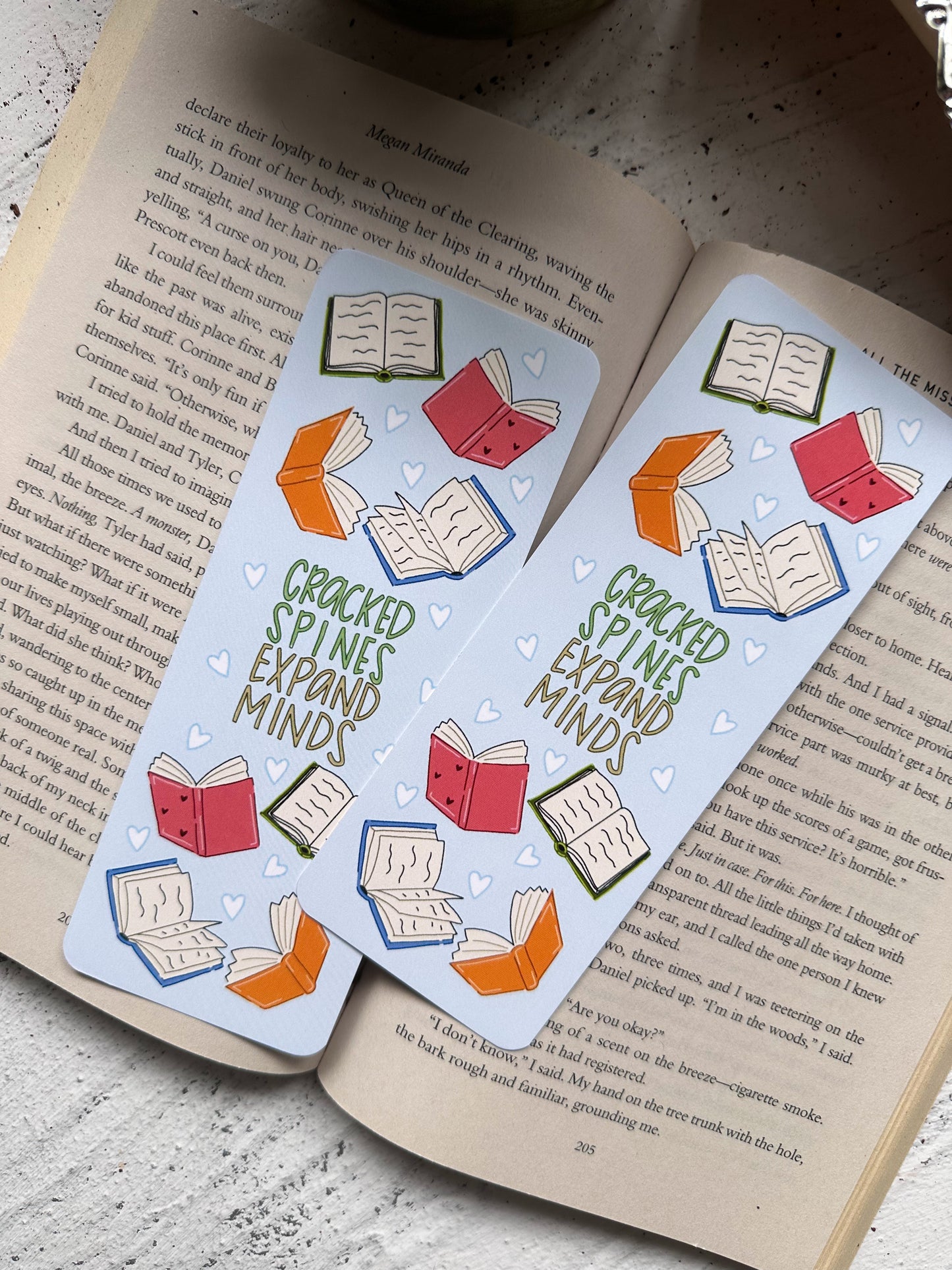 Cracked Spines Expand Minds Bookmark